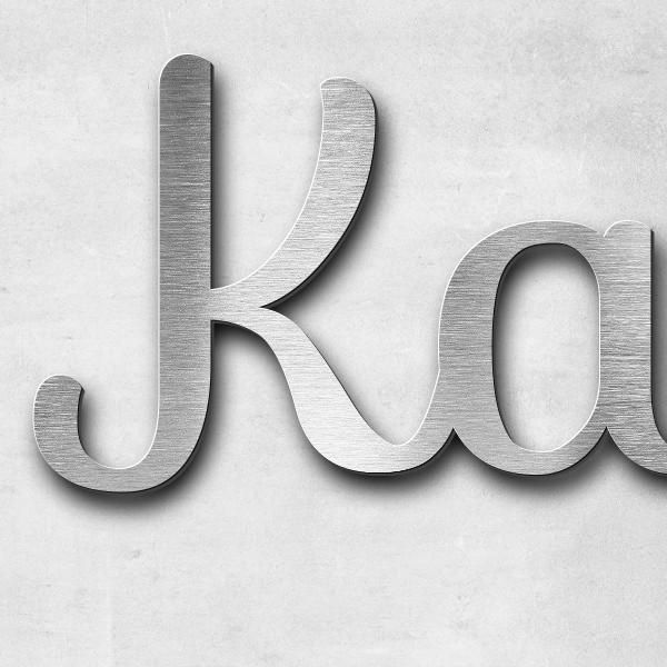 Schriftzug "KamikazeKarma" in Schriftart "Autumna", Edelstahl V2A gebürstet - hochwertig & wetterbes