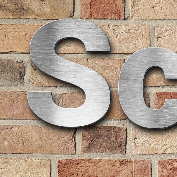 Schriftzug "Schillerslage" in Schriftart "Sans", Edelstahl V2A gebürstet - hochwertig & wetterbestän