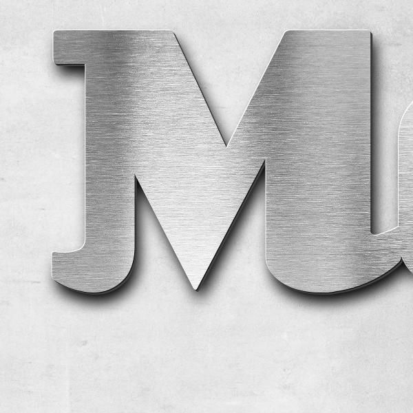 Schriftzug "Monika Grabbert" in Schriftart "Woofer", Edelstahl V2A gebürstet - hochwertig & wetterbe