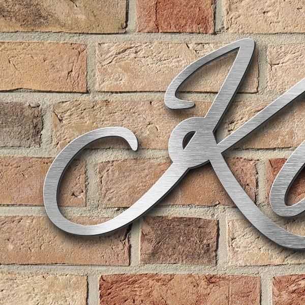 Schriftzug "Köper Heerde 50" in Schriftart "Jessari", Edelstahl V2A gebürstet - hochwertig & wetterb