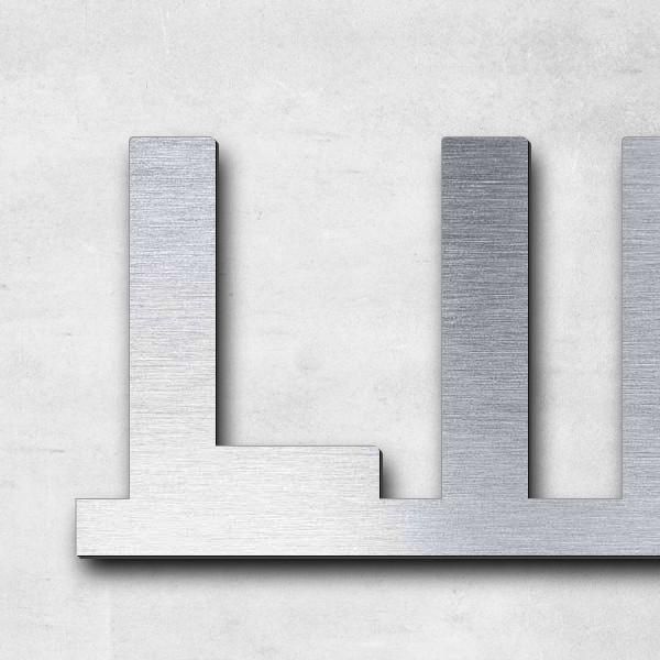 Schriftzug "Liner 85LE" in Schriftart "Baseline", Acryl-Kunststoff in Edelstahl-Optik gebürstet - ho