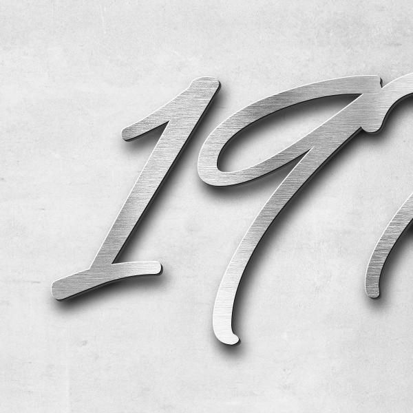 Schriftzug "1976-2025" in Schriftart "Jessari", Edelstahl V2A gebürstet - hochwertig & wetterbeständ