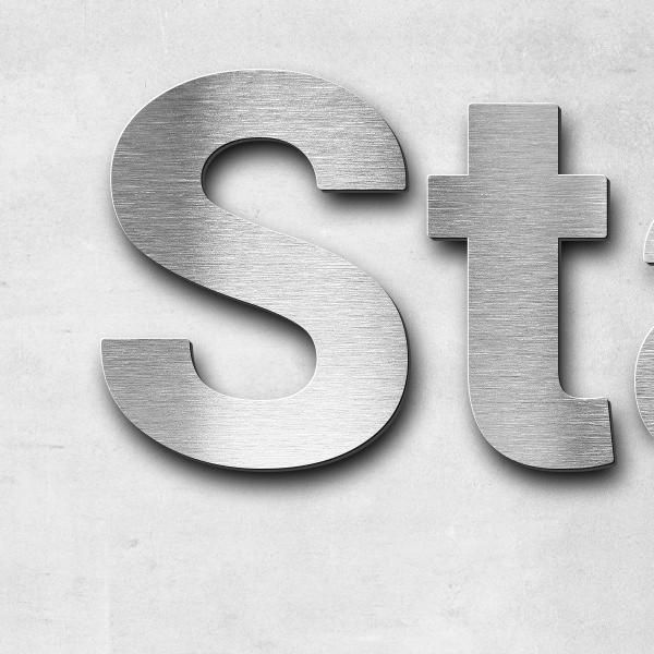 Schriftzug "Stadtteilhaus Oberreut" in Schriftart "Sans", Edelstahl V2A gebürstet - hochwertig & wet