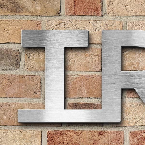 Schriftzug "Trauerzentrum" in Schriftart "Baseline", Edelstahl V2A gebürstet - hochwertig & wetterbe