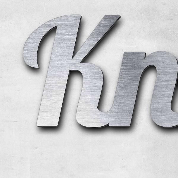 Schriftzug "Knobel" in Schriftart "Catdog", Acryl-Kunststoff in Edelstahl-Optik gebürstet - hochwert
