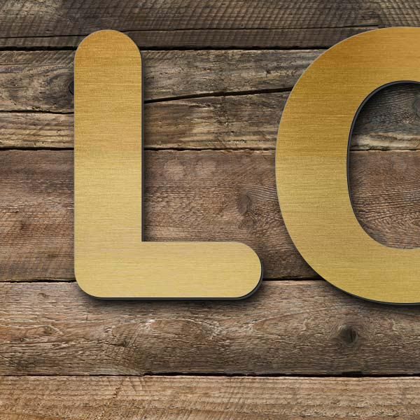 Schriftzug "LOUNGE" in Schriftart "Classic", Acryl-Kunststoff in Messing-Optik gebürstet - hochwerti