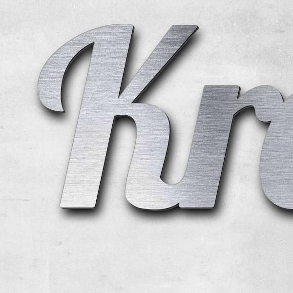 Schriftzug "Krawallbruder", Acryl-Kunststoff in Edelstahl-Optik gebürstet - hochwertig & wetterbestä