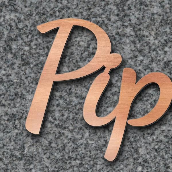 Schriftzug "Pipka Rüdiger" in Schriftart "Filigrano", Acryl-Kunststoff in Kupfer-Optik gebürstet - h