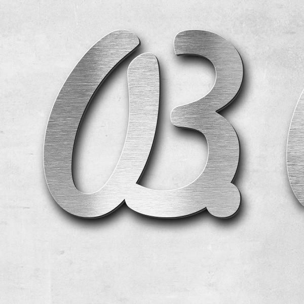 Schriftzug "03.03.42-27.12.24" in Schriftart "Scriptus", Edelstahl V2A gebürstet - hochwertig & wett