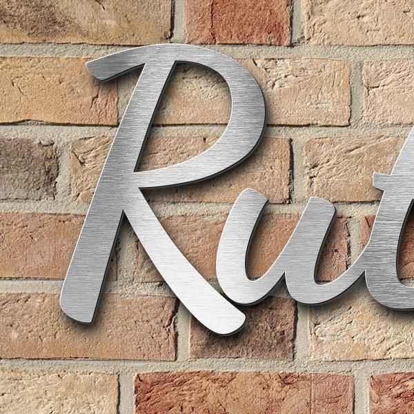 Schriftzug "Ruth Reinecke-Dahinden" in Schriftart "Filigrano", Edelstahl V2A gebürstet - hochwertig