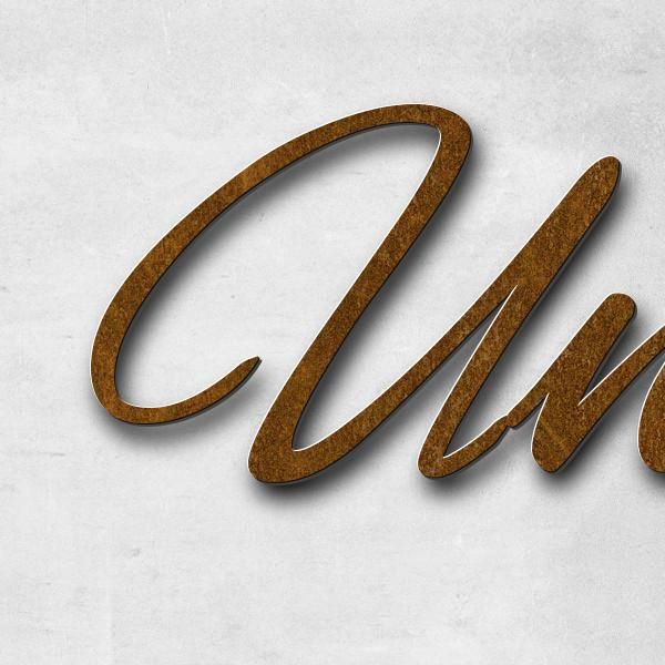 Schriftzug "Unvergessen" in Schriftart "Jessari", Cortenstahl voroxidiert - hochwertig & wetterbestä