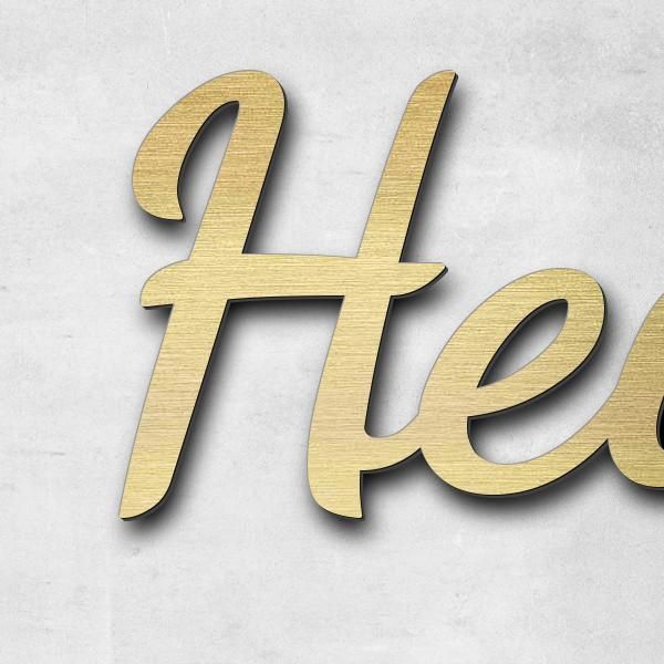 Schriftzug "Heinz Häusler 1931-2026" in Schriftart "Filigrano", Acryl-Kunststoff in Messing-Optik gebürstet - hochwertig & wetterbeständig