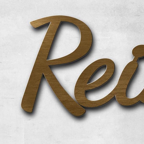 Schriftzug "Reiner" in Schriftart "Filigrano", Messing antik patiniert - hochwertig & wetterbeständi