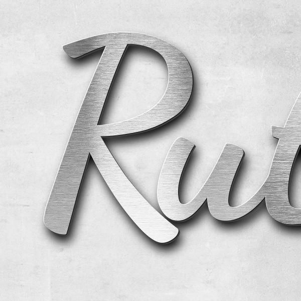 Schriftzug "Ruth Reinecke-Dahinden" in Schriftart "Filigrano", Edelstahl V2A gebürstet - hochwertig