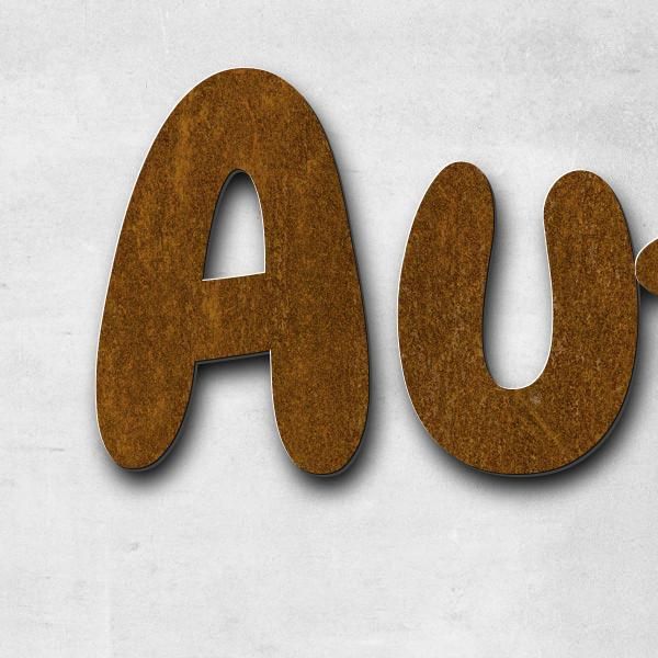 Schriftzug "Auftragsarbeiten nach Wunsch" in Schriftart "Darius", Cortenstahl voroxidiert - hochwer